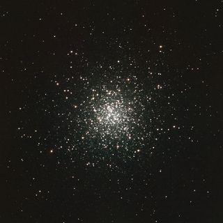 Concentration of very luminous white dots at the centre of the image against a very black background